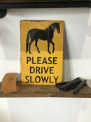 Metal sign - Please drive slowly